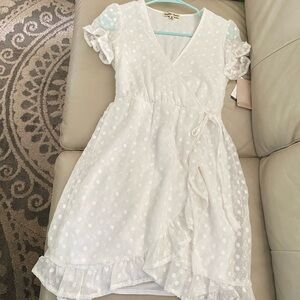a beautiful white Charmed Hearts brand dress